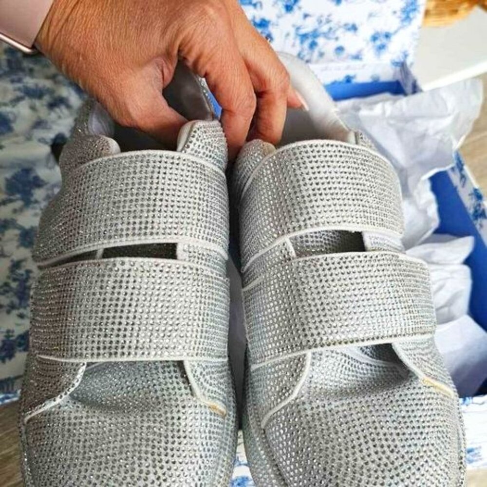 She is Cheval rhinestone sneakers fits 8.5 or 9